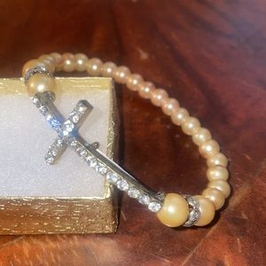 - New crystal cross stretch bracelet peach os